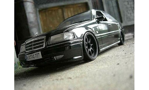 Mercedes Classe C AMG 1/18 Ut Models 36 black diecast model cars