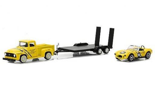 Diecast model cars Ford F-1 1/64 Greenlight 00 yellow 1954 with Coventry Moteurs 289 Cobra and Flatbed Trailer Ford F-1 1/64 Greenlight 00 yellow 1954 with Coventry Moteurs 289 Cobra and Flatbed Trailer diecast model cars