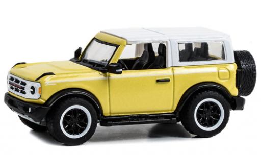 Ford Bronco 1/64 Greenlight Heritage Edition yellow clair/white 2023 diecast model cars