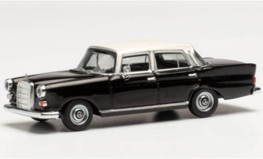 Diecast model cars Mercedes 200 1/87 Herpa (W110) black/white Mercedes 200 1/87 Herpa (W110) black/white diecast model cars