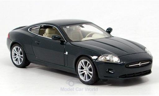 Diecast model cars Jaguar XK 1/24 Welly 150 Coupe metallic green ohne Vitrine Jaguar XK 1/24 Welly 150 Coupe metallic green ohne Vitrine diecast model cars