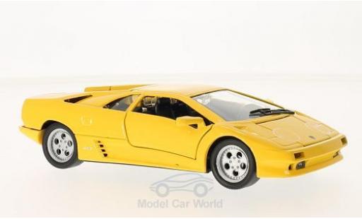 Diecast model cars Lamborghini Diablo 1/24 Welly yellow 1998 ohne Vitrine Lamborghini Diablo 1/24 Welly yellow 1998 ohne Vitrine diecast model cars